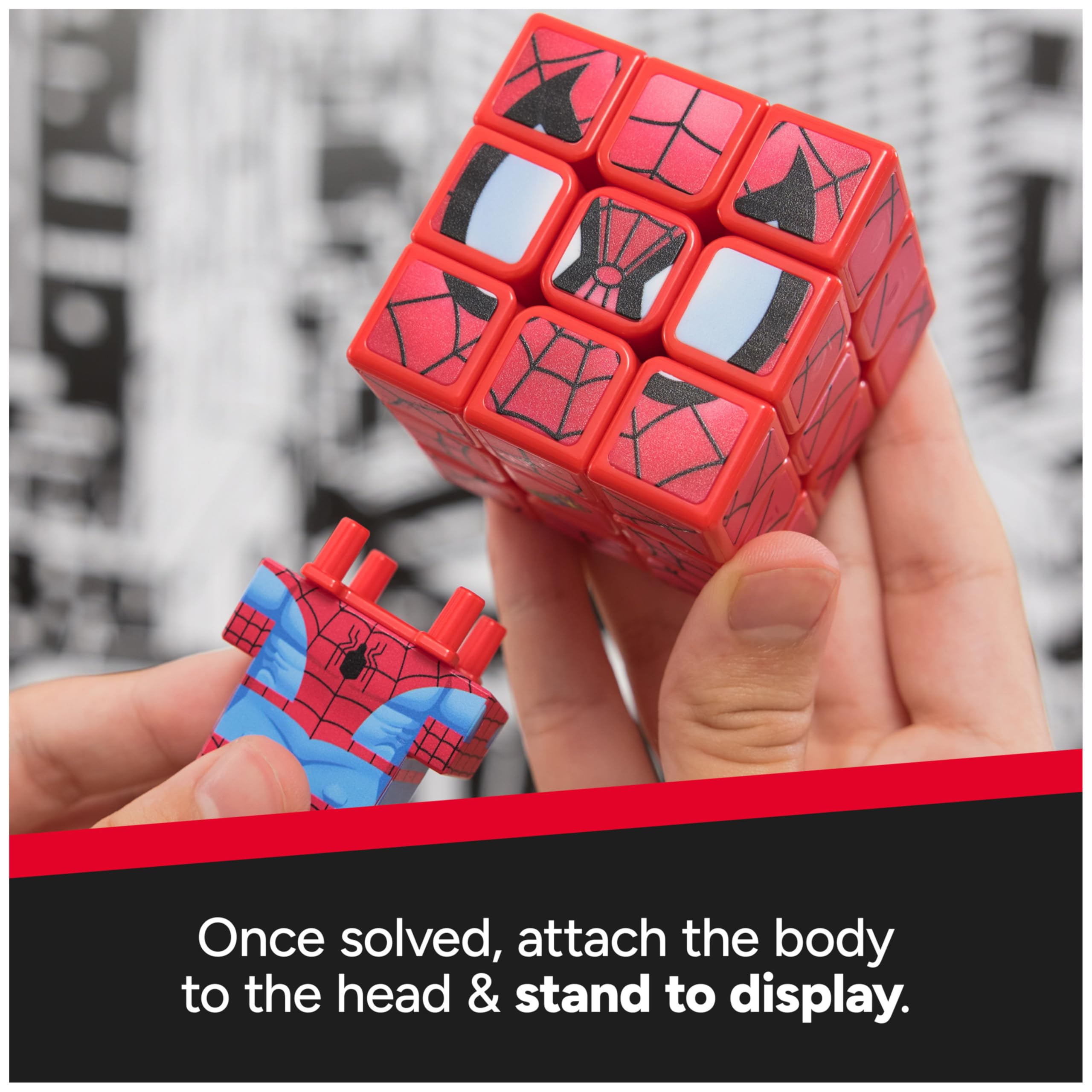 Rubik’s Spider-Man Cuber in hand for portable brain-teaser on the go.