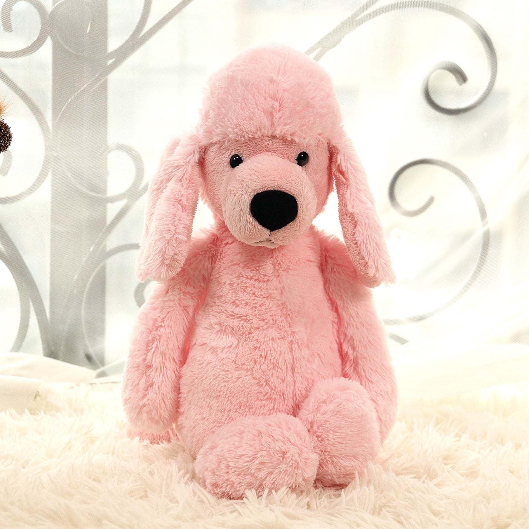 Ruzucoda pink plush poodle toy features huggable 12-inch size for little hands.