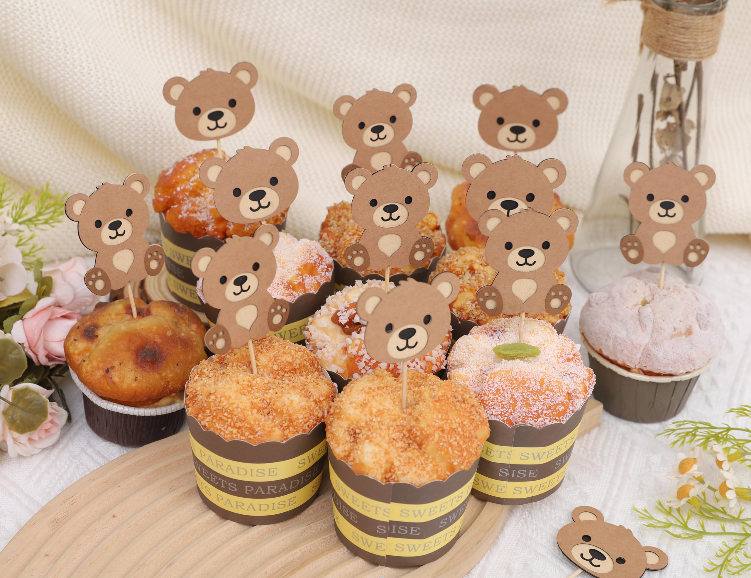 Rweseo Bear cupcake decorations add charming accents to treats.