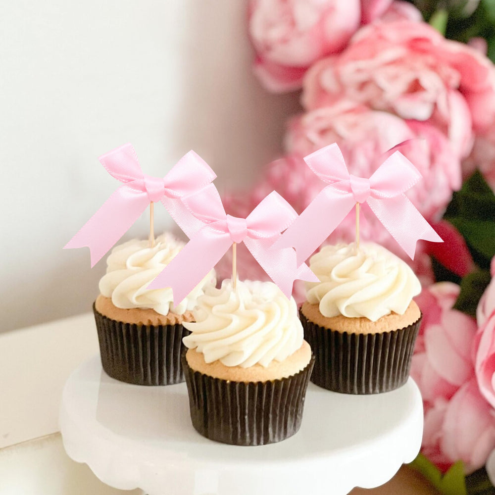Rweseo Coquette Pink Bow Cupcake Topper with hidden stem for easy insertion.