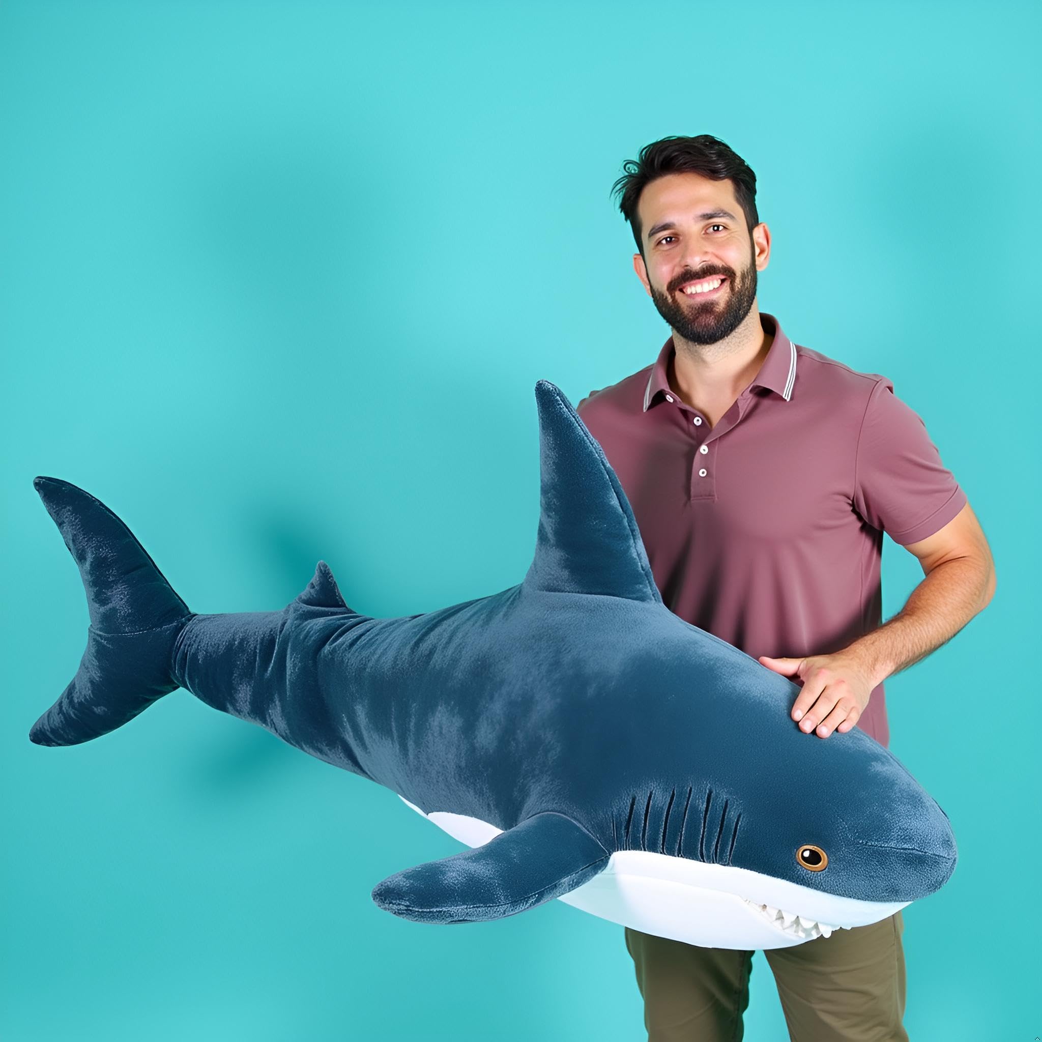 Ryttir cloud-soft coral fleece shark offers a gentle, comforting touch.