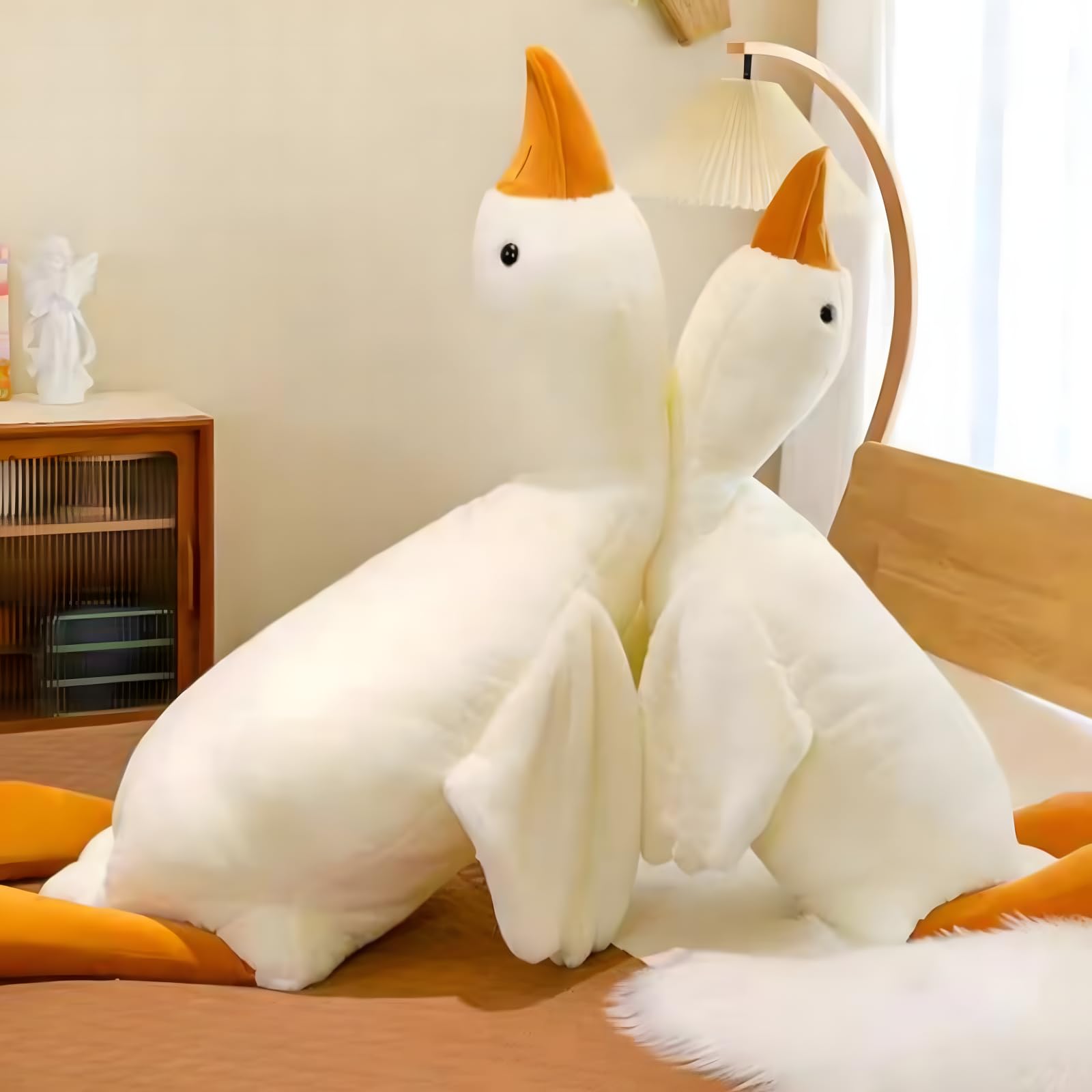 Ryttir Giant Goose Plush features a large side pocket for warmth and storage