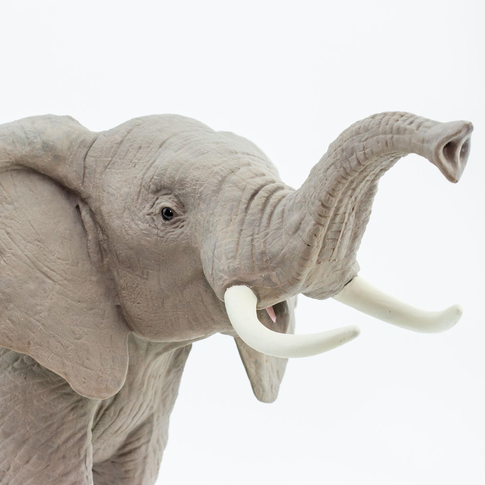 Safari Ltd elephant figurine size 11.7 inches for scale and display.