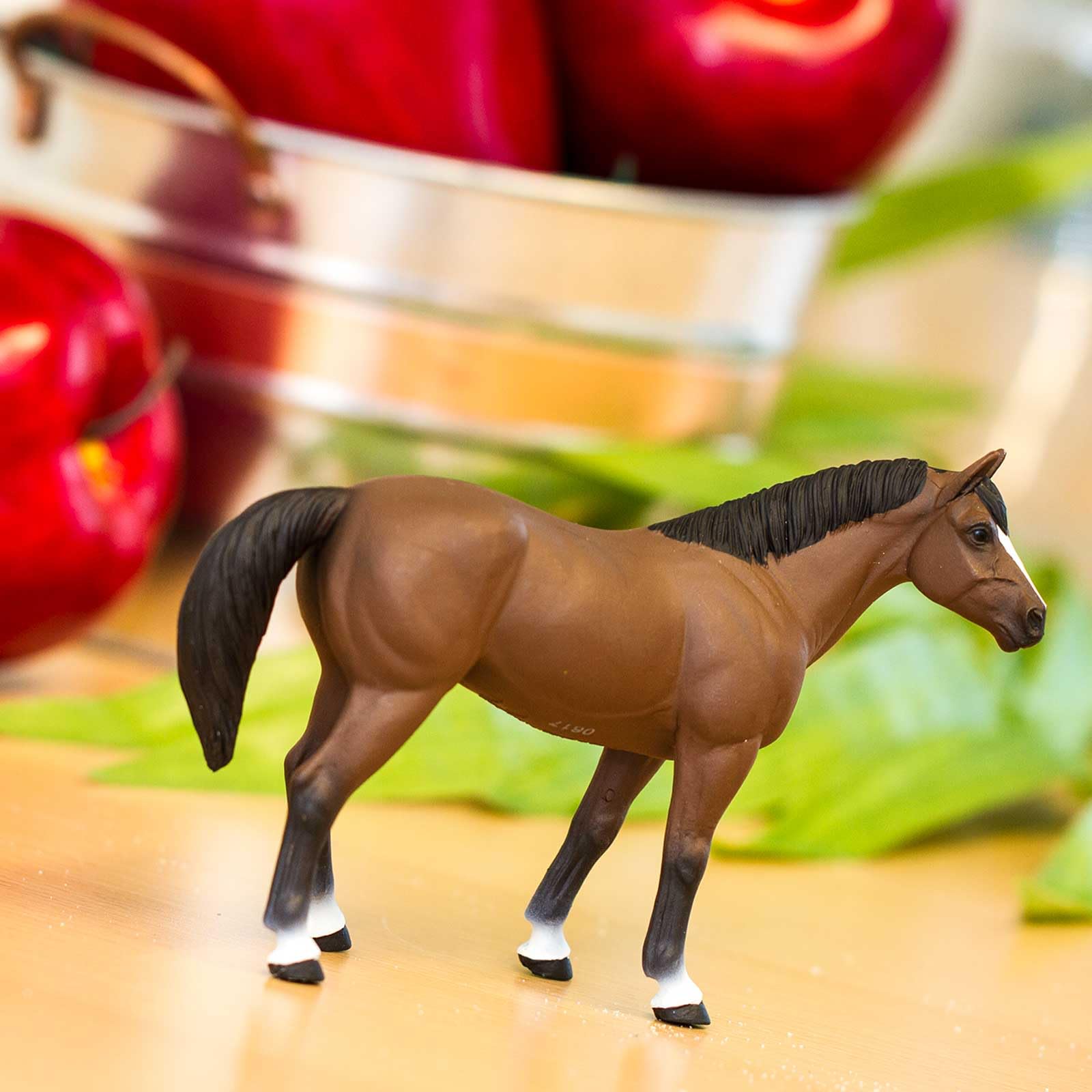 Safari Ltd. American Quarter Horse Gelding figurine side profile for breed study.
