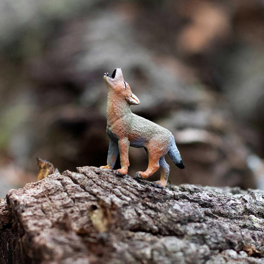 Safari Ltd. Coyote Pup figurine side view highlighting detailed fur texture