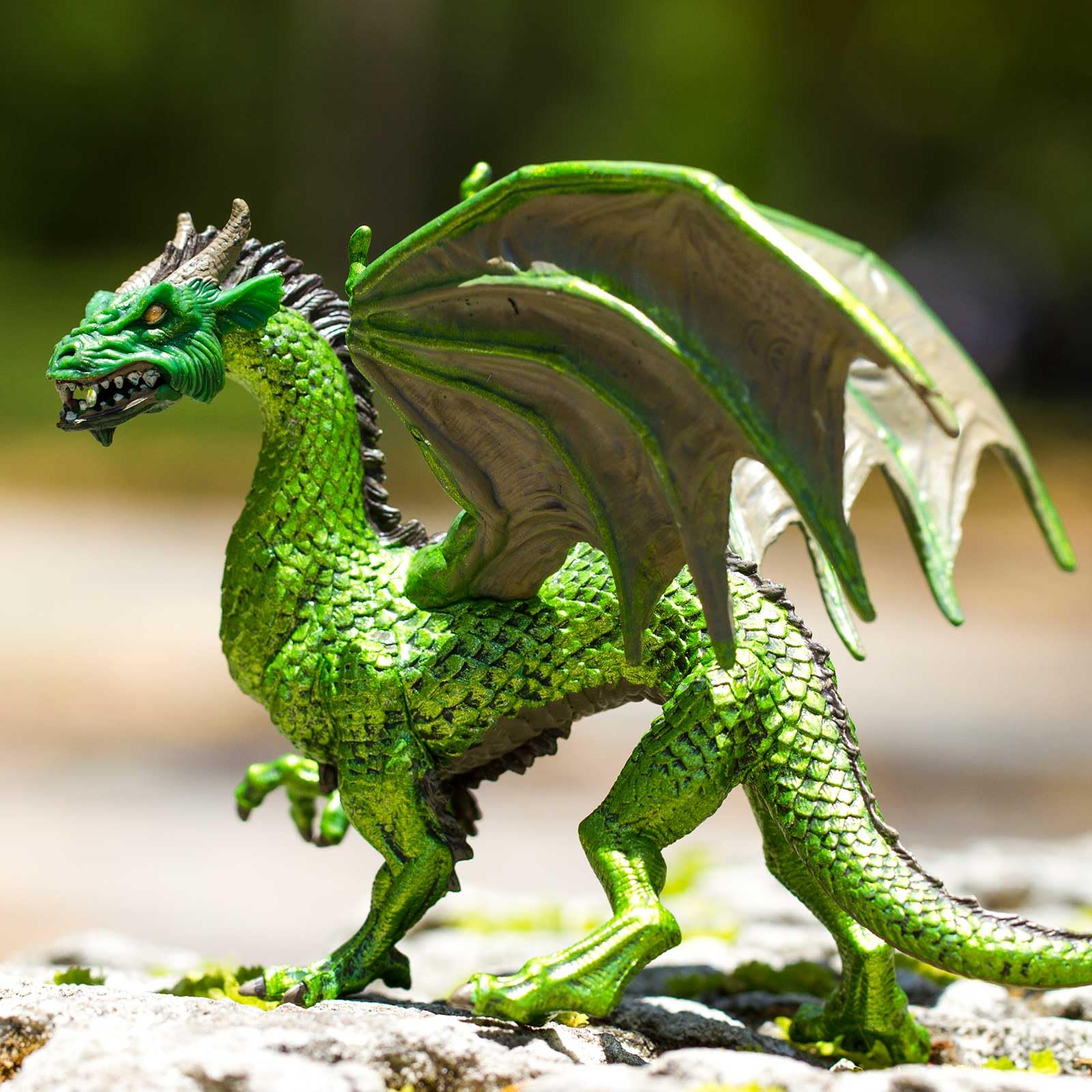 Safari Ltd Forest Dragon figurine side profile shows claws for heroic storytelling.