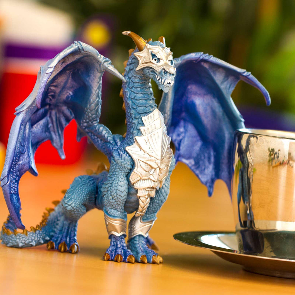 Guardian Dragon figurine measures about 6 inches wide and 5 inches tall paperback-sized