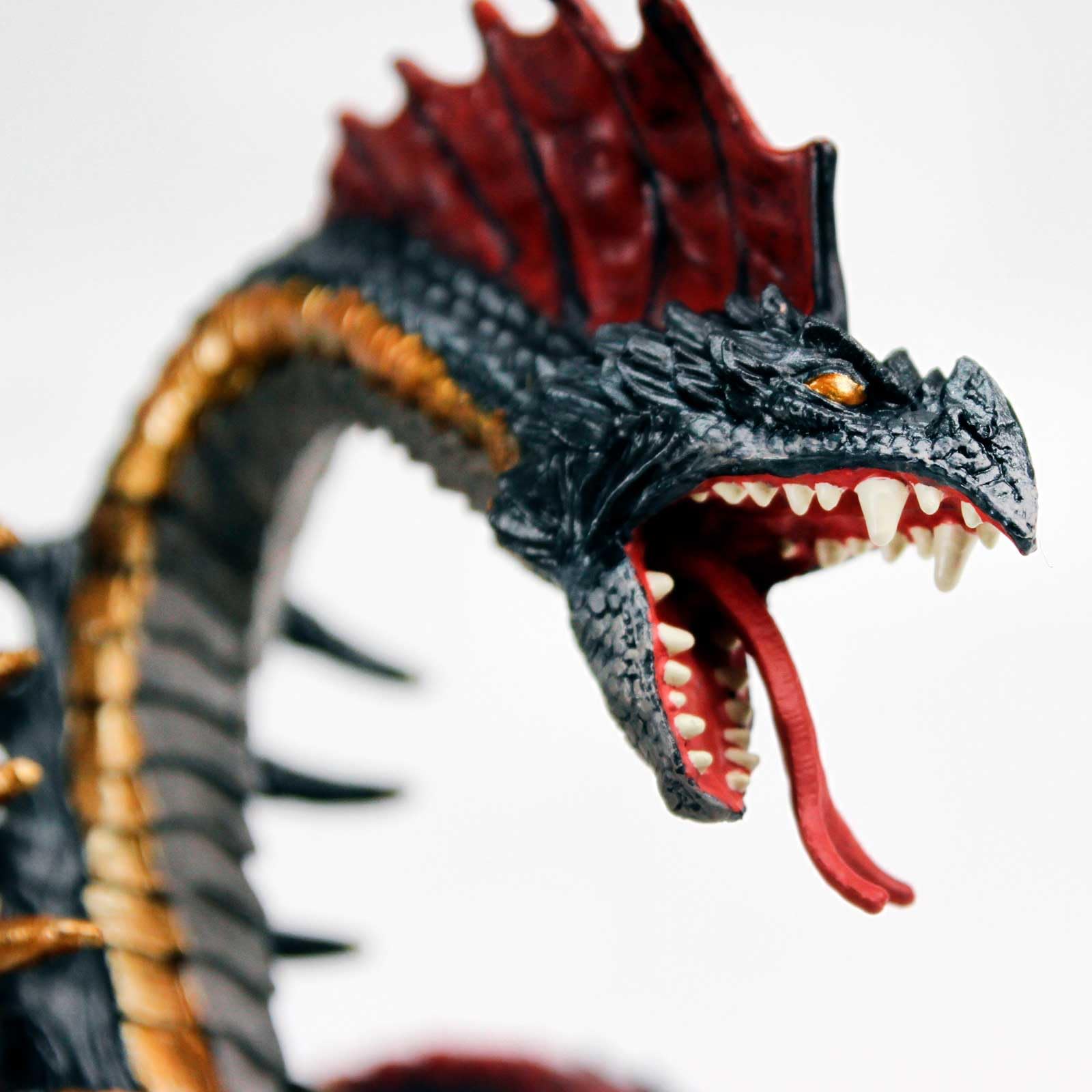 Safari Ltd Basilisk figurine in diorama scene, inspiring fantasy play and storytelling
