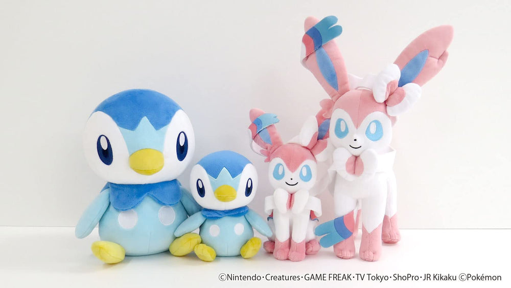 Sanei Piplup plush features flipper arms and yellow feet for poseable display.