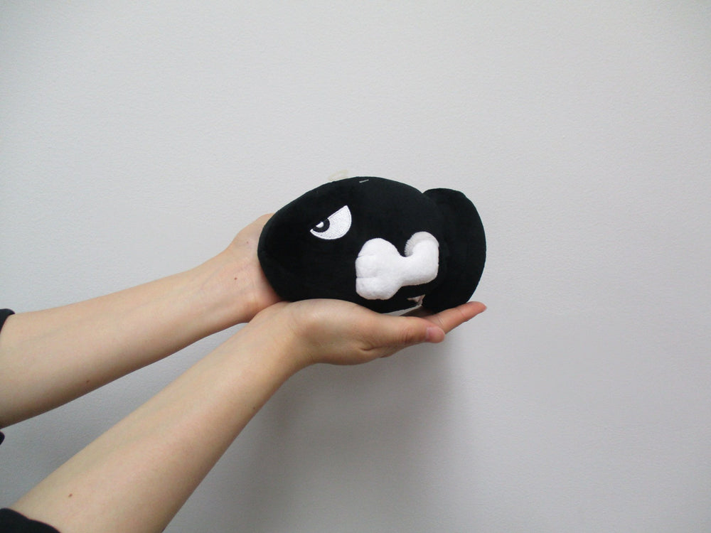 Sanei Bullet Bill plush side view, ideal shelf display for fans.