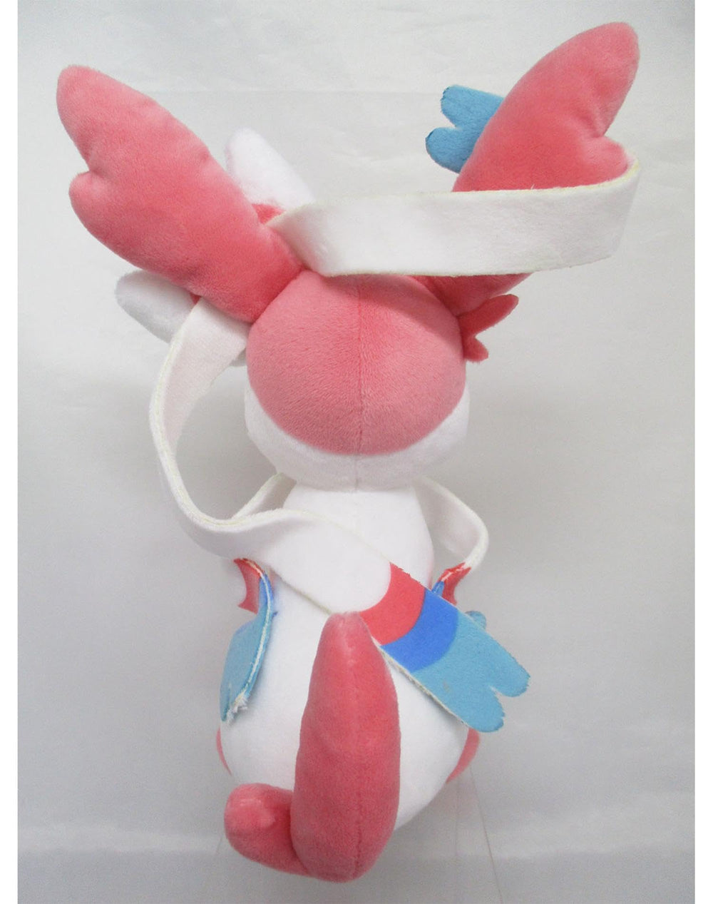 Sanei Sylveon plush tail and paws close-up suitable for shelf display.