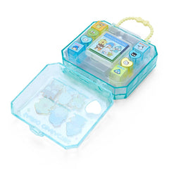 The set includes stamps and a compact case for on-the-go crafts.