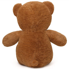 Sausudols Teddy Bear 16-inch in a living room setting adds warm decorative charm.