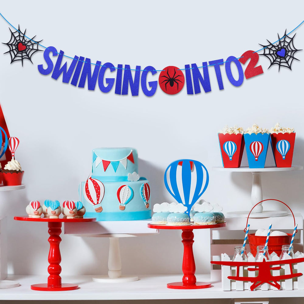 SAVITA spider web pattern banner in red and blue colors