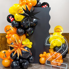 Saxuxu confetti balloons in orange, black, yellow add festive shine