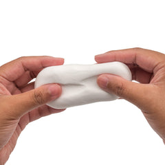 Hands shaping Scentco Air Dough with pliable, ultra-light material