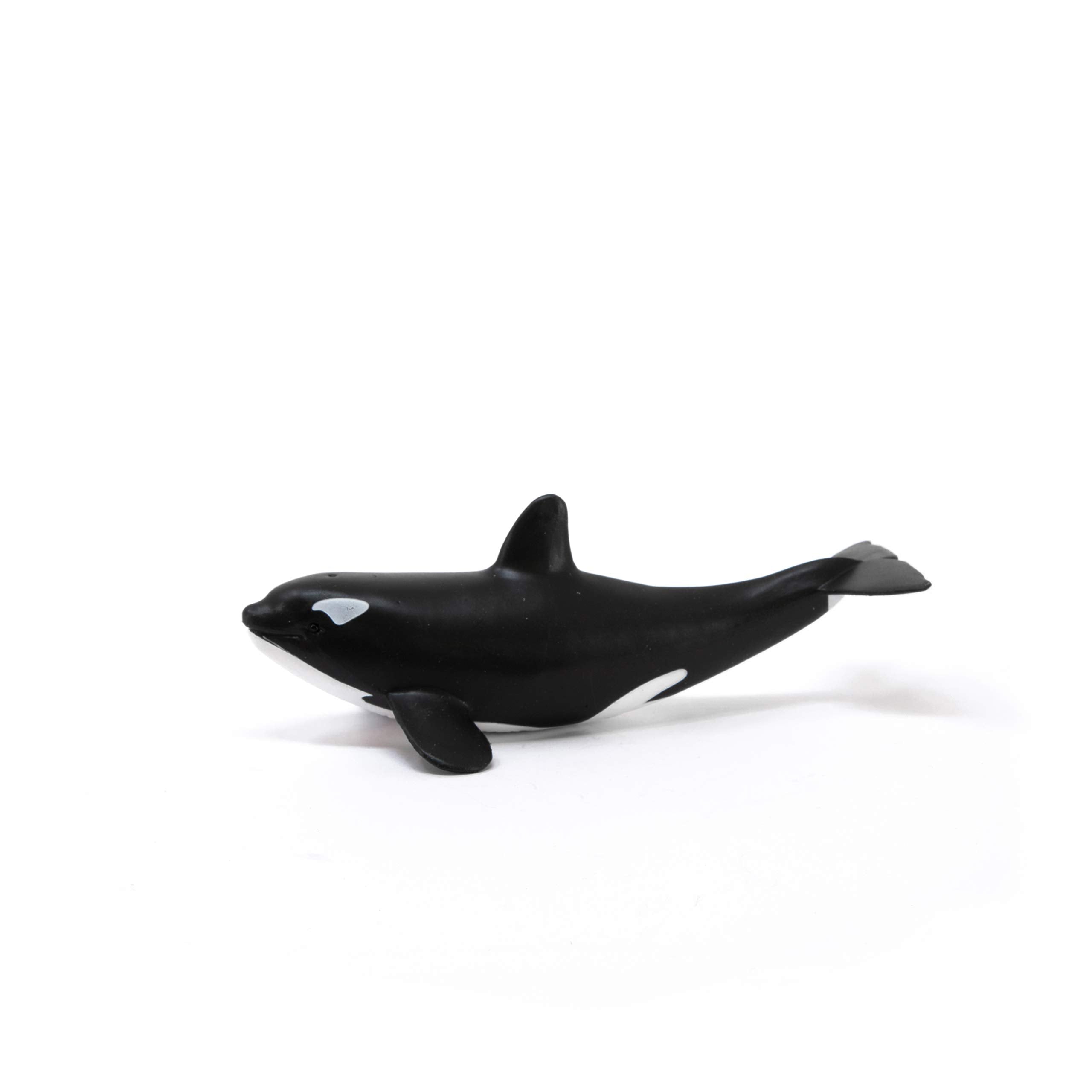 Schleich Baby Orca in child's hand supports safe, open-ended play.