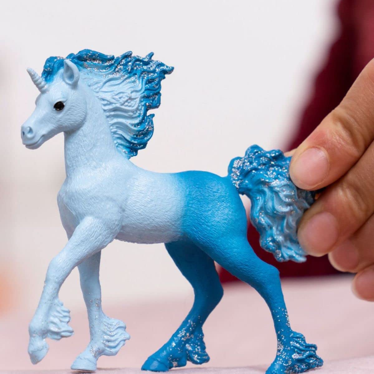 Schleich Bayala Elementa Water Flame Baby Unicorn side view inspires pretend adventures.