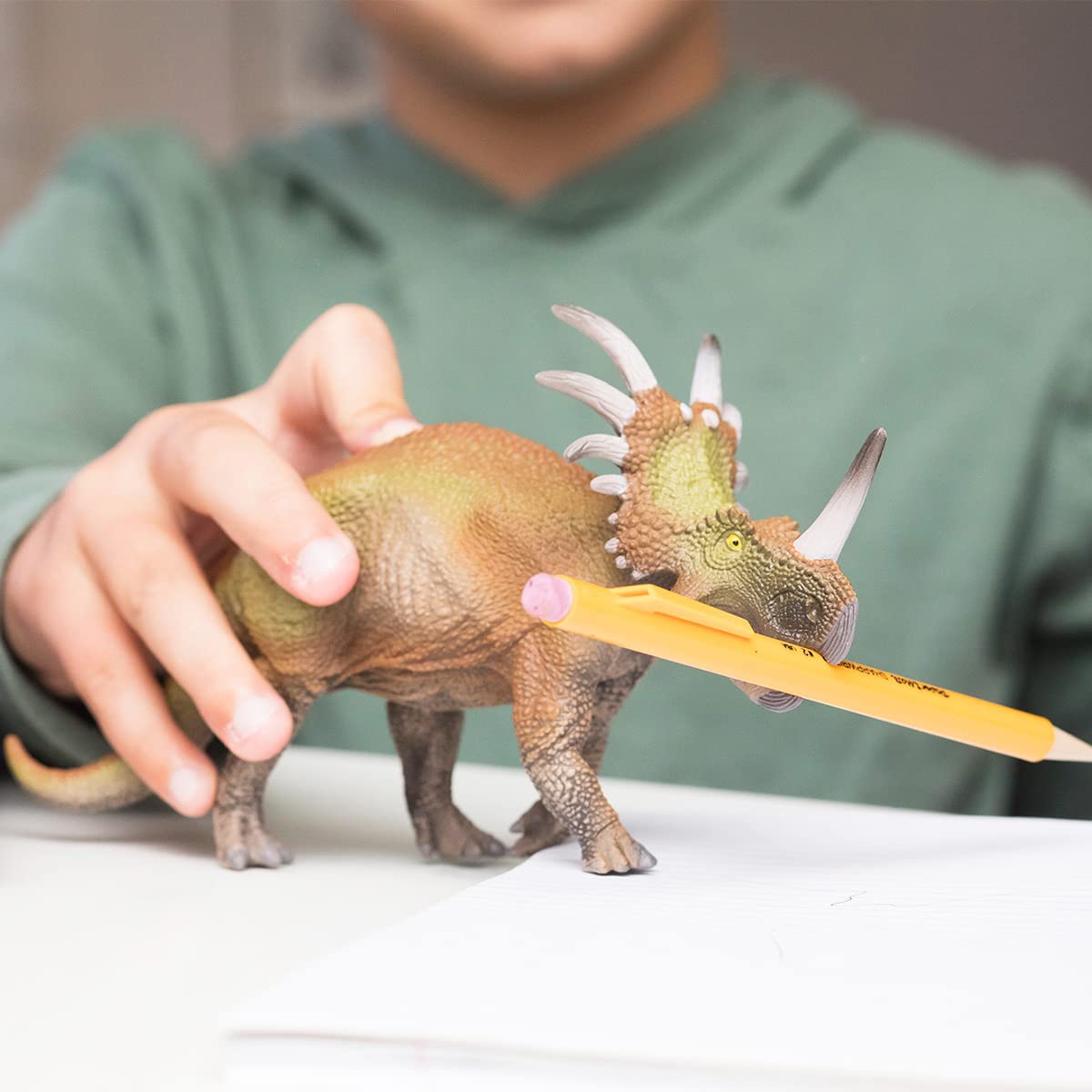Schleich Styracosaurus figure side profile highlighting detailed sculpting.