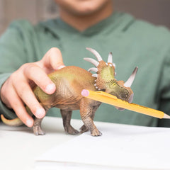 Schleich Styracosaurus figure side profile highlighting detailed sculpting.