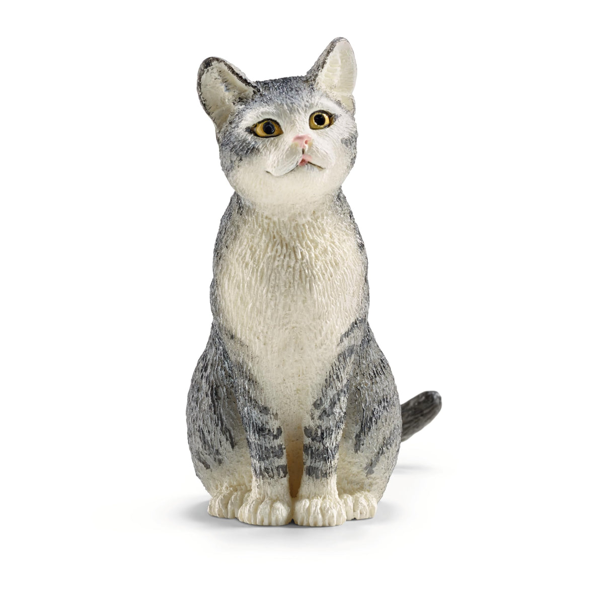 Schleich Farm World gray and white cat figurine sitting for imaginative play.