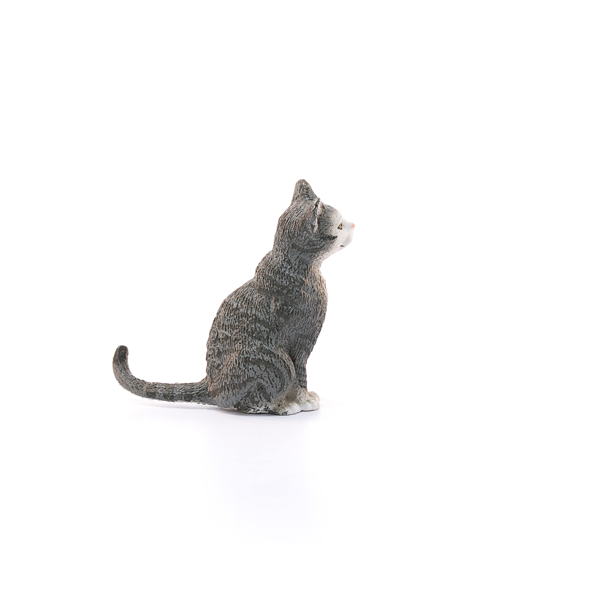 Schleich Farm World cat figurine placed in a farm scene to spark storytelling.