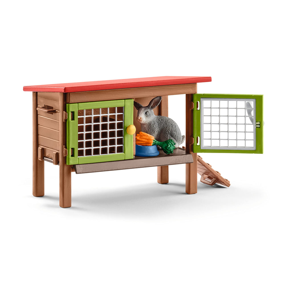 Schleich hutch with opening doors and fence pieces for customizable runs.