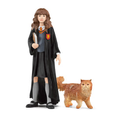 Schleich Hermione Granger figurine with book, ideal for imaginative play.