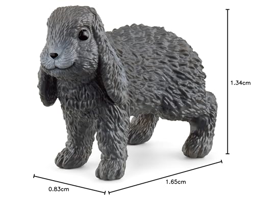 Schleich lop-eared bunny on green grass invites gentle farm adventures.