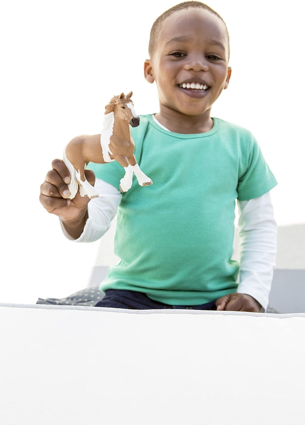 Schleich Tinker Mare detailed sculpture enhances storytelling and pretend grooming.