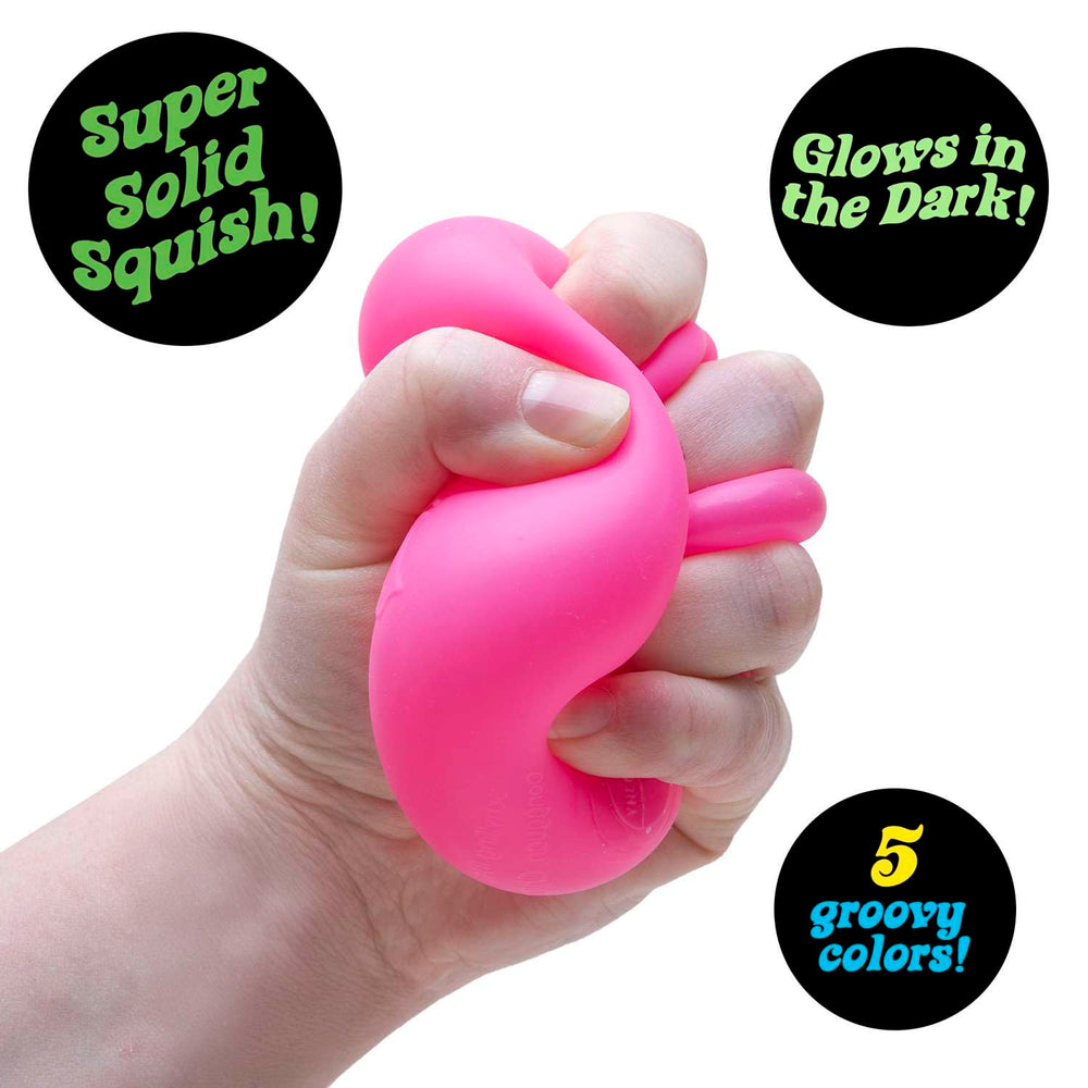 Schylling NeeDoh Nice Cube Glow returns to its square shape after playful squishing.