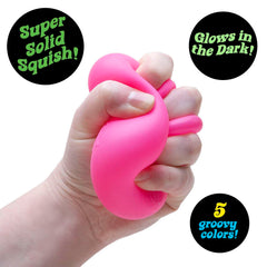 Schylling NeeDoh Nice Cube Glow returns to its square shape after playful squishing.