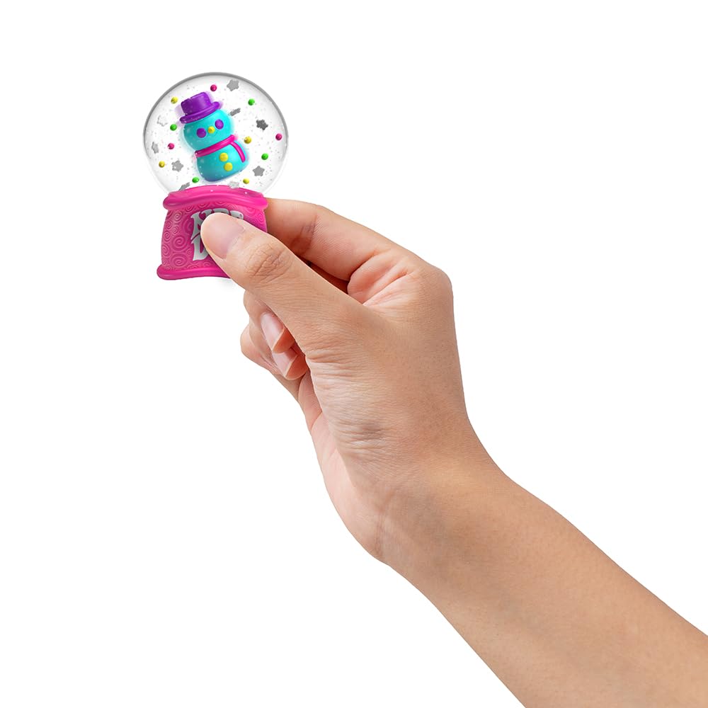 Schylling NeeDoh Squishmas snow globe interior shows floating snowflakes for soothing focus.
