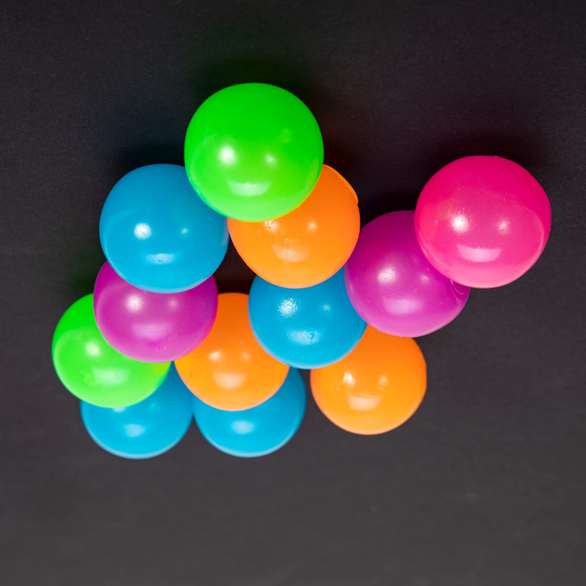 Schylling NeeDoh Stickums color-variation closeup showing playful glow