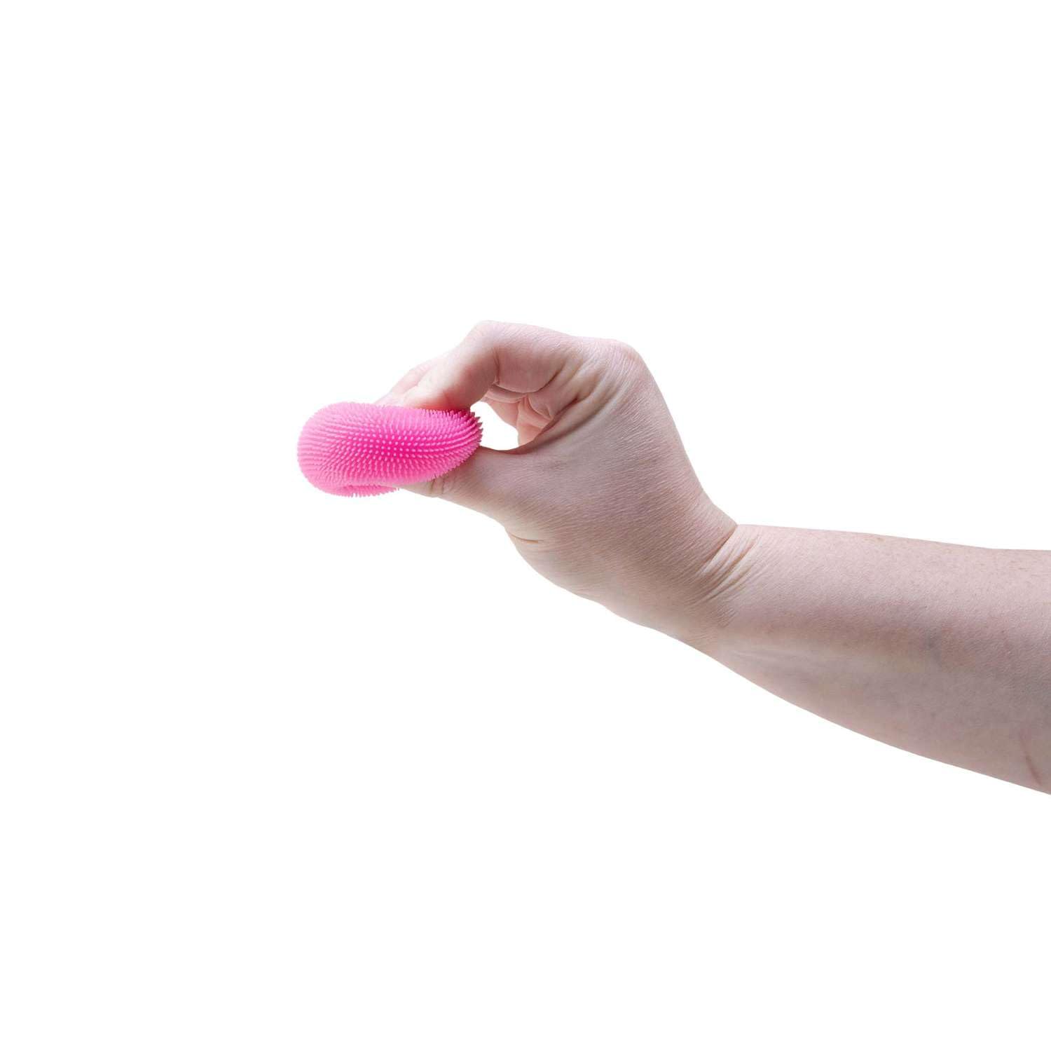 NeeDoh Teenie Fuzzball held in hand for portable, on-the-go use
