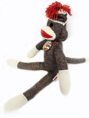 Schylling sock monkey 20-inch holding pose emphasizes size ideal for gifts and display.