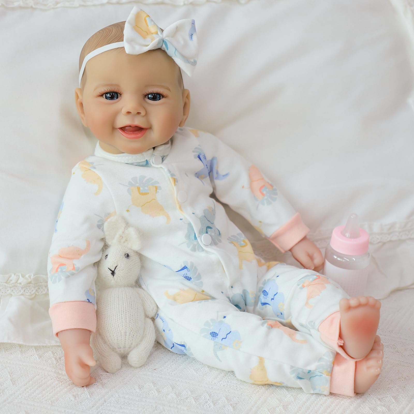 SCOM Baby Doll with realistic hand-sewn eyelashes for a lifelike look.