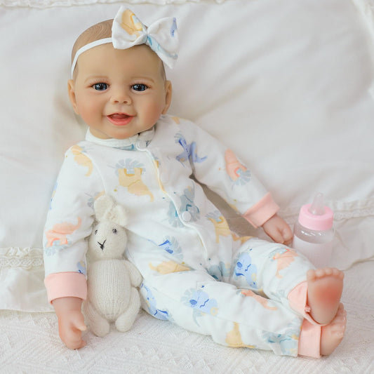 SCOM Baby Doll with realistic hand-sewn eyelashes for a lifelike look.