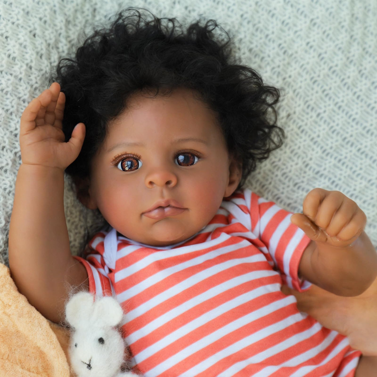 SCOM realistic reborn doll face close-up for lifelike play and companionship.