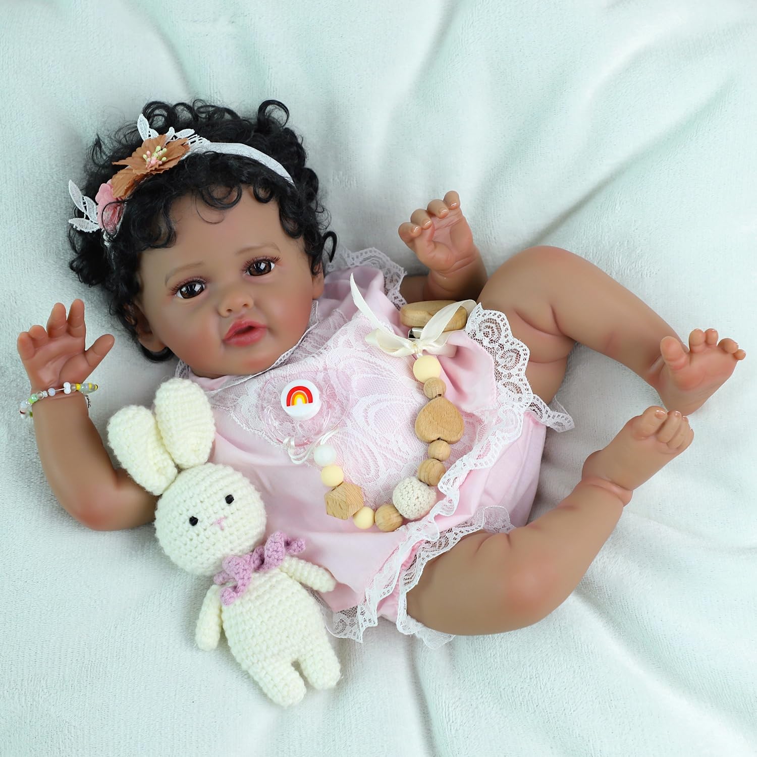 SCOM Reborn includes feeding bottle and magnetic pacifier for interactive play
