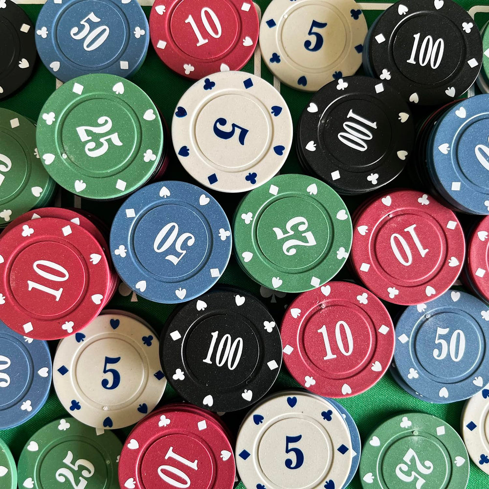 SEETOOOGAMES chips in play creating a casino-like atmosphere at the table
