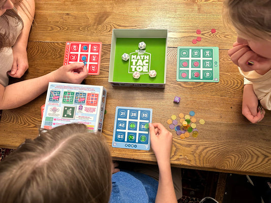 Semper PlaySmart Dice-Math-Tac-Toe components ready for family learning.