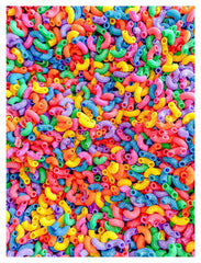 Sensory-N-Stuff rainbow elbow pasta in a bin for colorful sensory play.