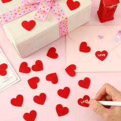 SEPGLITTER felt hearts shown with adhesive for easy assembly.