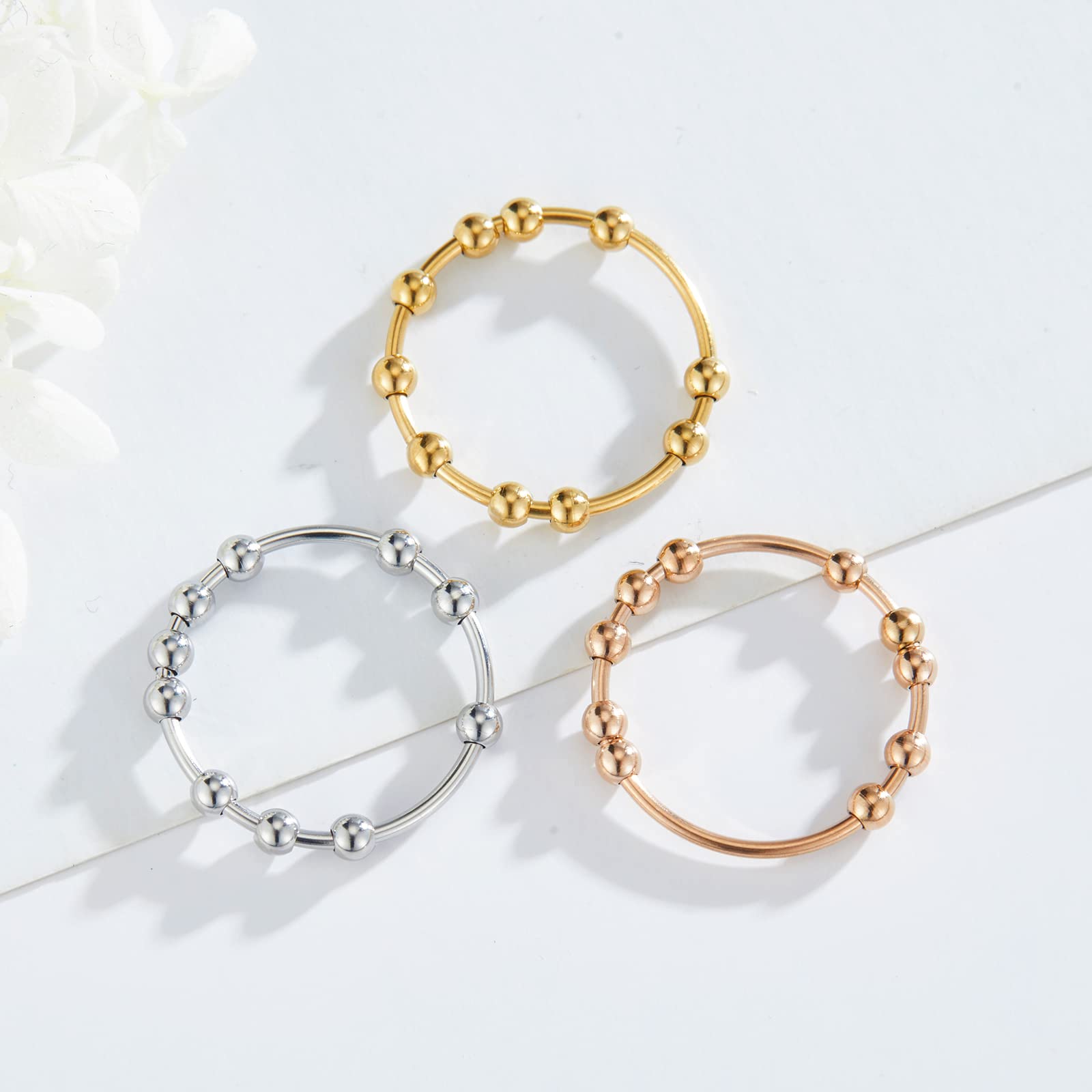 SERYNOW fidget ring in silver, gold, or rose gold for versatile style and mood.