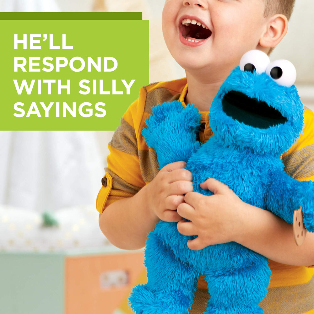 Sesame Street Cookie Monster plush, interactive cues for phrases and playtime.