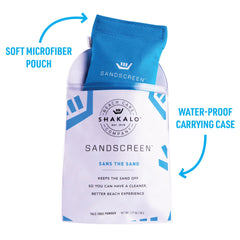 SHAKALO Sandscreen in use on hands to wipe away sand.