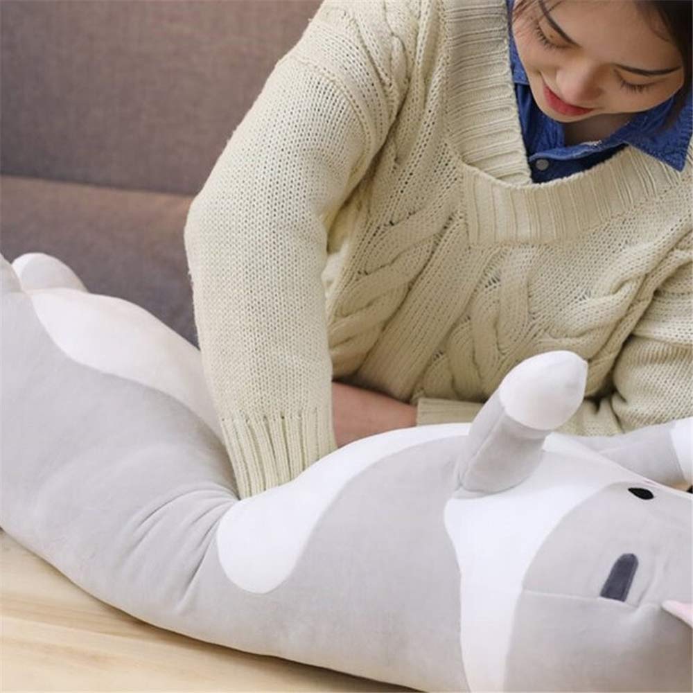Shangman plush cat doll lounging on sofa illustrates lumbar support and cuddle potential.
