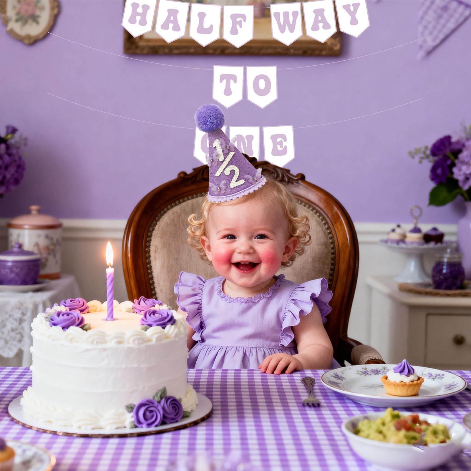 Shanmorine cake smash moment with purple decorations and banner.