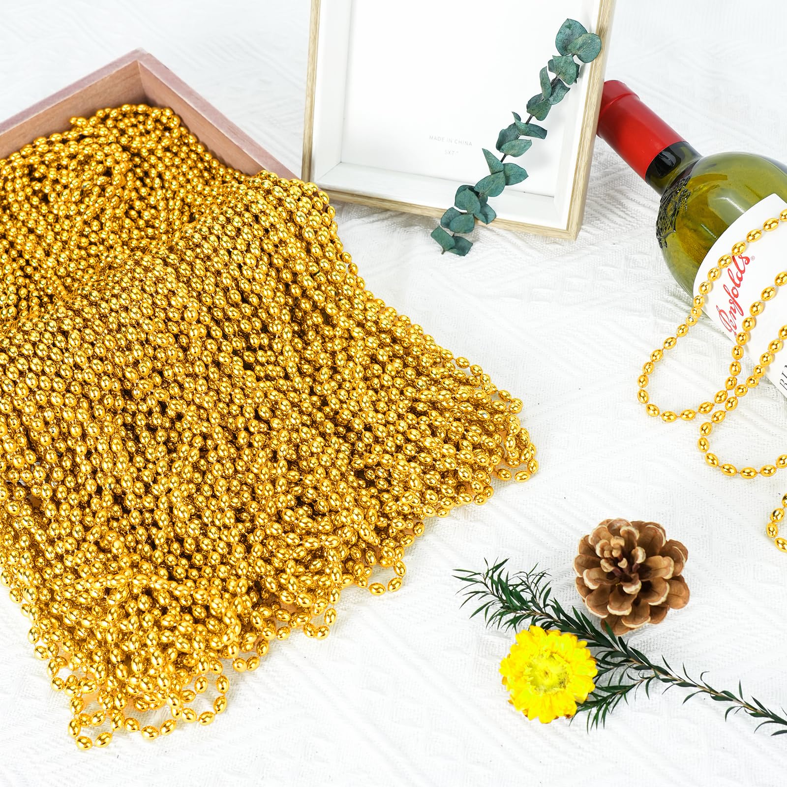 SHAOQINLIN festive party decor gold beads on display for events